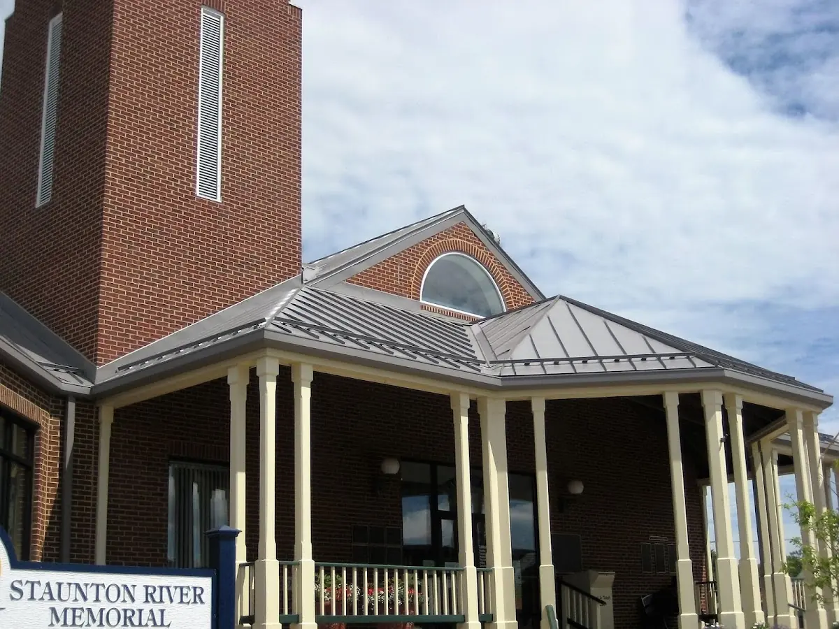 Skilled roofing craftsmen working on a residential roof in Austell